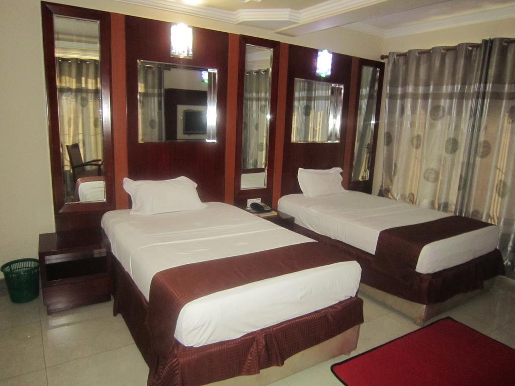 Donsuite Hotel Daressalam Zimmer foto