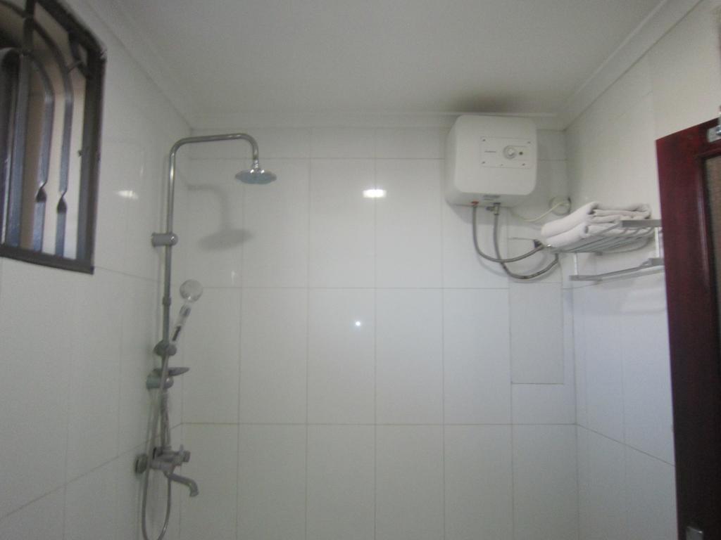 Donsuite Hotel Daressalam Zimmer foto